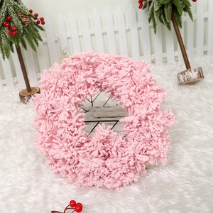 Pink flocked Christmas wreath with fluffy chenille texture for cozy holiday home decor