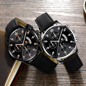 Detailed macro shot of business quartz watch with rhinestone scales and fan-shaped calendar