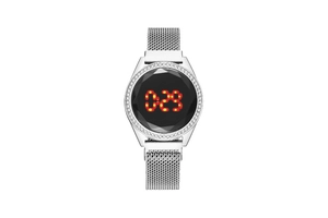 Close-up of women's silver LED watch with rhinestone bezel and Milanese mesh band