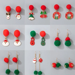 Detailed grid showing nine pairs of Christmas earrings with velvet balls and bells