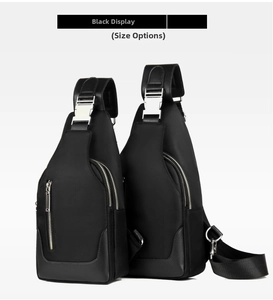 Detail view of two sizes of black nylon chest bags with silver zippers and leather trim