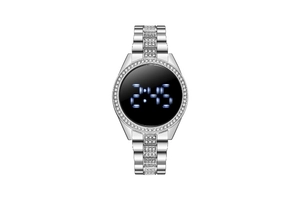 Detail of silver rhinestone digital watch with blue LED display showing the time