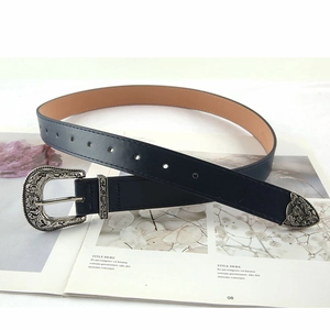 Three-piece retro carved buckle leather belt for women in black on magazine