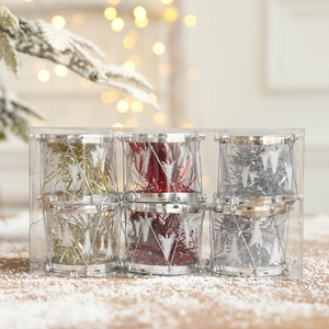 Set of 6 Christmas drum ornaments in gold, red, and silver on a festive snow background