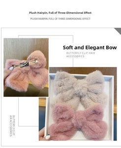 Detail showing plush bow hair clips in pink and beige with sturdy silver metal claws