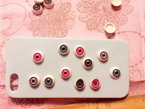 Detail of 12mm DIY doll eyes in pink, purple and blue-grey with white bases