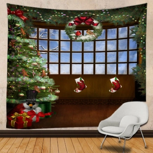 Detailed view of large Christmas tapestry with snowman and festive tree on a white wall