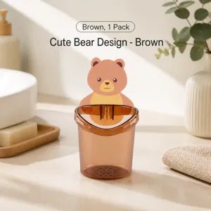 Detail of bear wall mount toothbrush holder with drainage holes in brown finish