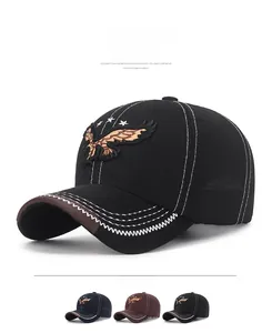 Detail of embroidered eagle and stars on baseball cap with multiple color options