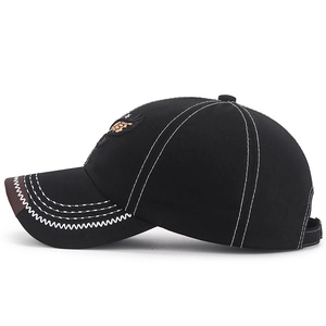 Men's black eagle embroidery baseball cap with white contrast stitching and leather trim