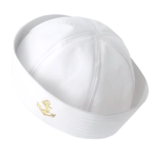 Detailed close-up of white canvas sailor hat with golden anchor embroidery emblem