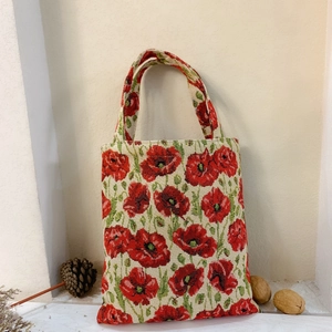 Macro view of vintage oil painting style tulip jacquard fabric texture on tote bag