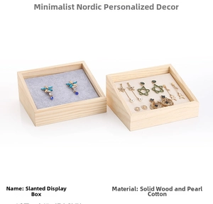 Detail of wooden jewelry display trays with slanted design and pearl cotton inserts