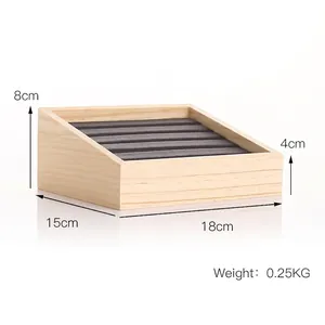 Solid wood tiered ring display tray with grey velvet slots measuring 18x15x8/4cm