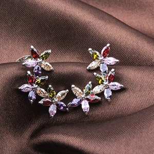 Elegant floral stud earrings with multi-color AAA zircon stones on silk background
