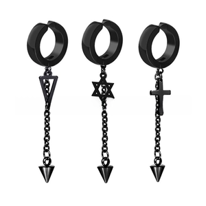 Detail of black punk non-pierced ear clips with hexagram cross and triangle charms