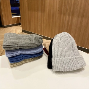 Winter knitted beanie hats in multiple colors with thick ribbed design for warmth