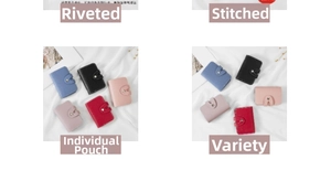 Detail showing colorful leather card holders with metal rivets and fine stitching details