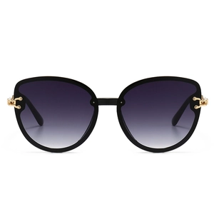 Women's oversized cat eye sunglasses with purple gradient lenses and gold metal accents