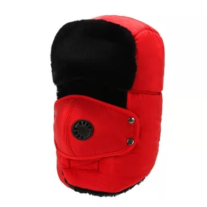 Winter Usanka trapper hat in red with black faux fur lining and built-in breathing valve