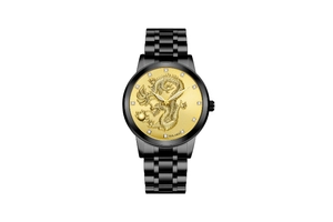 Close-up of golden dragon relief dial and crystal indices on black steel watch