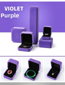 Detailed set of premium deep violet velvet jewelry boxes for rings and necklaces