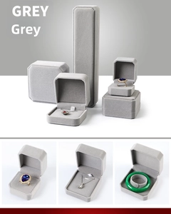 Detailed set of grey velvet jewelry boxes for rings necklaces and bracelets