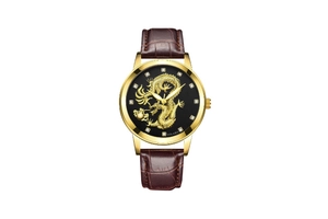 Detailed macro view of the gold dragon relief dial on a brown leather strap watch