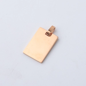 Macro shot of rectangular rose gold stainless steel pendant with smooth mirror finish