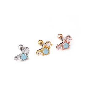 Three surgical steel cartilage studs with blue opal and side crystals in gold and silver