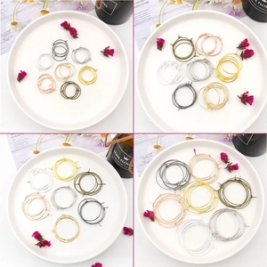 DIY round hoop earring parts in gold silver rose gold and bronze finish on white plates