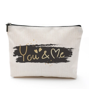 Waterproof cotton linen makeup bag with You & Me gold glitter text on beige canvas