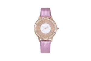Detail of rose gold watch case with sparkling diamonds and pink textured leather strap