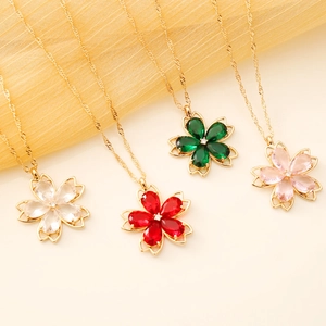Colorful floral crystal pendant necklaces in gold twist chains with various gemstones