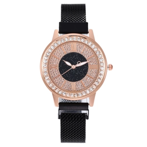 Montre quartz femme ciel étoilé avec lunette en strass et bracelet magnétique