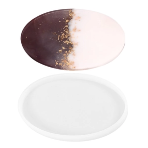 Oval silicone resin mold with two-tone purple and pink tray and gold leaf flakes