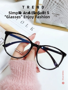 Detailed view of black oversized square frames with clear anti-blue light lenses