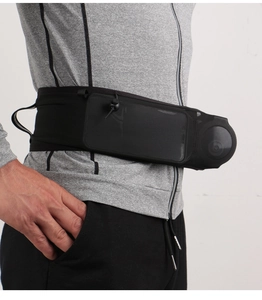 Detail of black running waist bag featuring elastic mesh pockets for water bottles