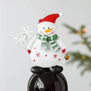 Hand-painted metal snowman wine bottle topper with bells and snowflake festive ornaments