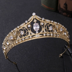 Close-up of golden bridal crown featuring elegant zircon crystals and rhinestones