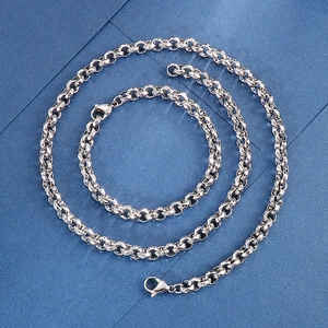 Sleek silver stainless steel chain necklace and bracelet set with lobster clasp