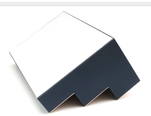 Detail of blue and white jewelry display stand with unique stepped edge design
