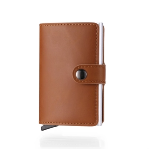 Detail of brown leather wallet with silver aluminum card holder and secure snap button