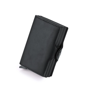 Macro shot of black PU leather wallet with automatic pop-up card slot and buckle strap