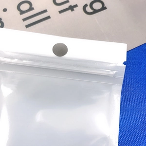 Translucent self-sealing plastic packaging bag with white top and circular hanging hole