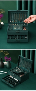 Macro view of dark green velvet jewelry box with necklace hooks and multi-layer storage