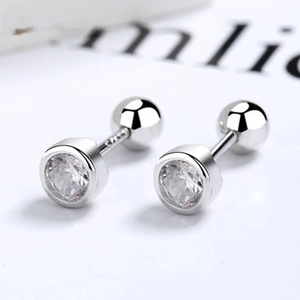 Macro detail of S925 sterling silver stamp and round zircon with screw ball backing