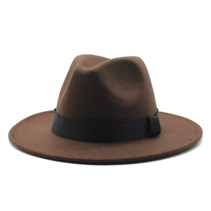 Detailed view of dark brown wool fedora hat with flat brim and black ribbon band