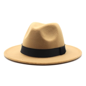 Detail of khaki wool fedora hat with a black grosgrain ribbon and flat brim profile