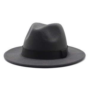 Detailed side view of dark grey wool fedora hat with a black grosgrain ribbon band